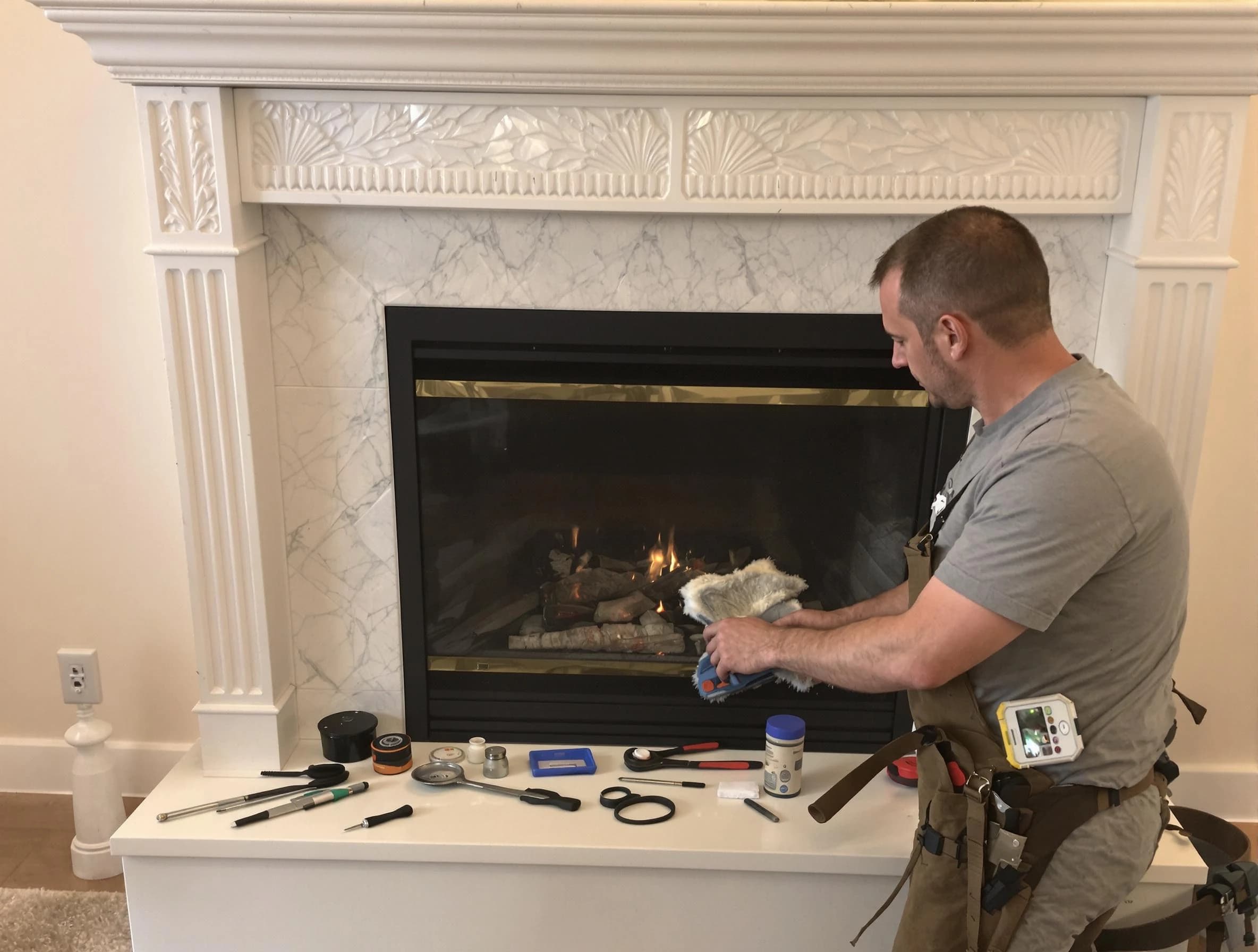 Summit Chimney Sweep performing fireplace maintenance in Summit, NJ